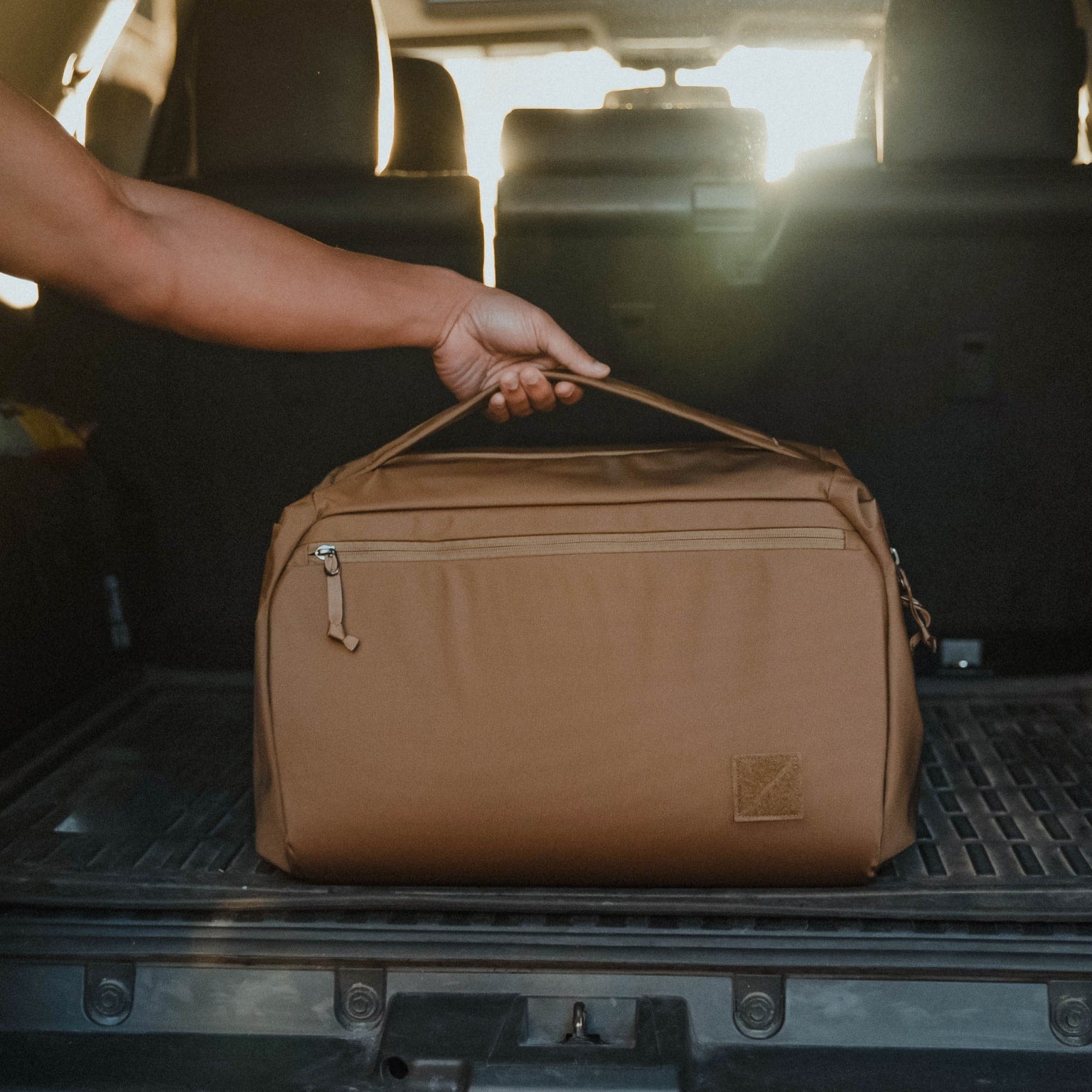 Transit Duffel 35L in Coyote Brown - top handle