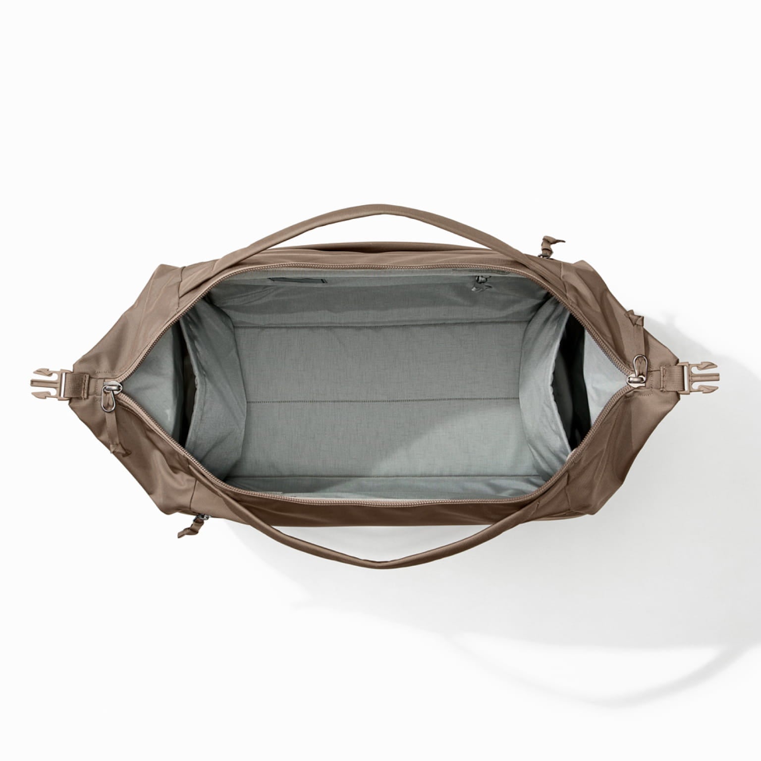 Transit Duffel 35L in Fossil Brown open and unpacked [13014d-FBN]
