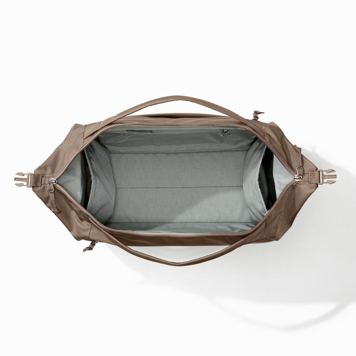 Transit Duffel 35L in Fossil Brown open and unpacked