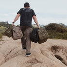 Transit Duffel 35L in OD Green grid all in hand Transit Duffel 35L in OD Green grid all in hand [13014d-ODG