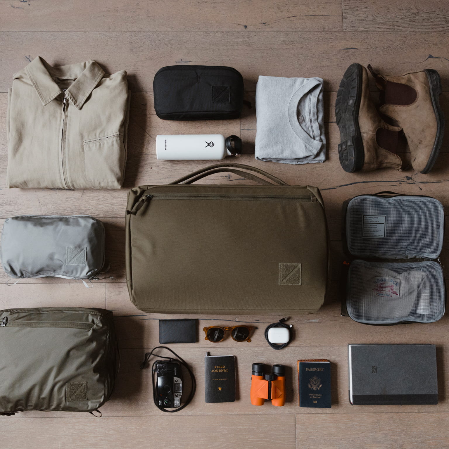 Transit Duffel 35L in OD Green grid laydown [13014d-ODG]