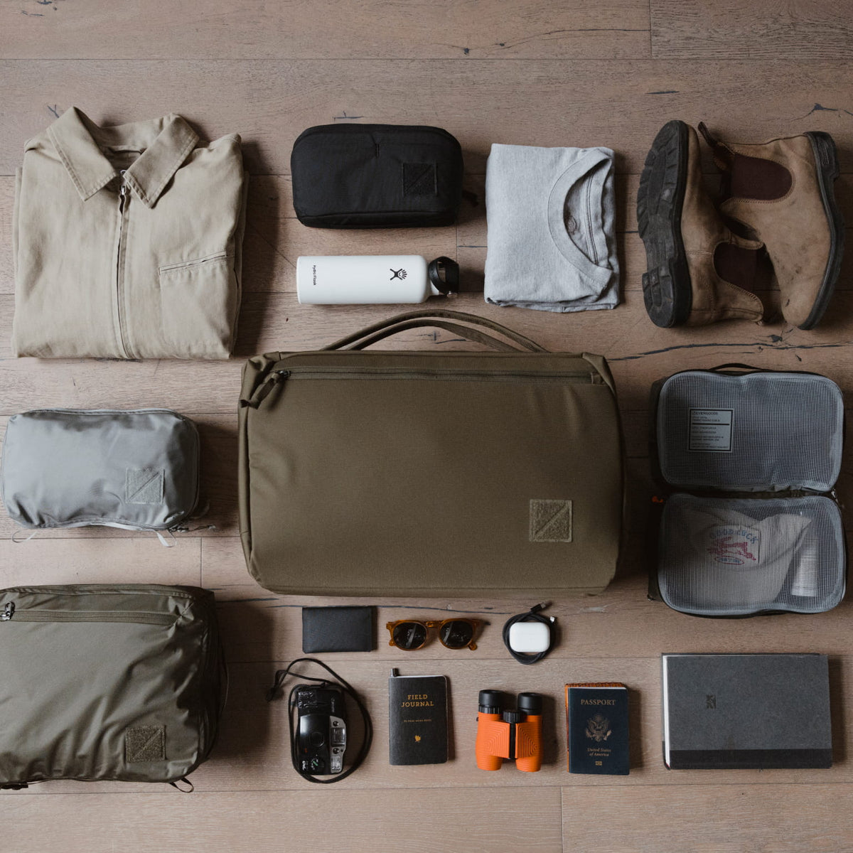 Transit Duffel 35L in OD Green grid laydown [13014d-ODG]