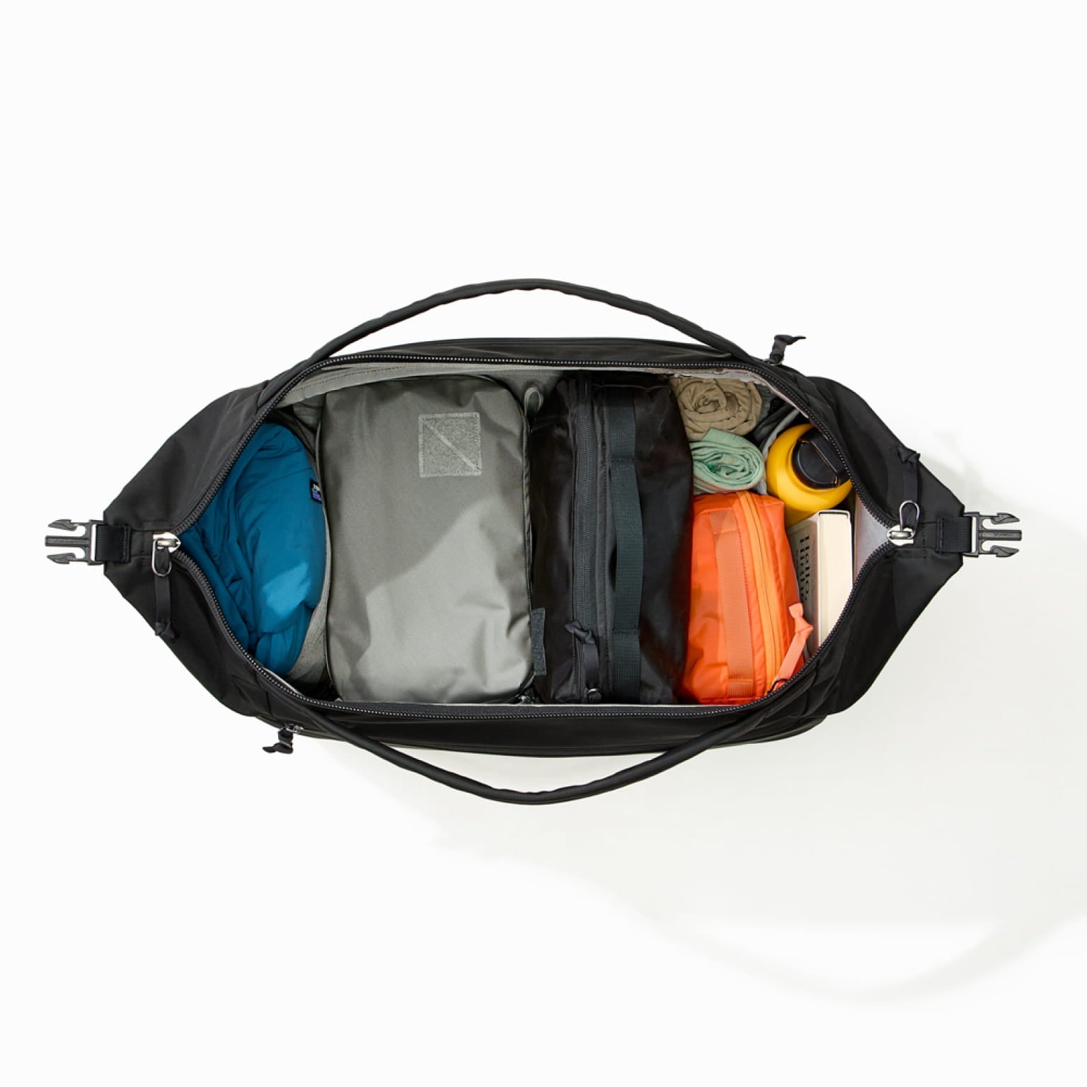 Transit Duffel 35L in Solution Dyed Black - open and packed [13014d-SBK]