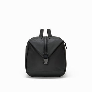 Transit Duffel 35L in Solution Dyed Black - end handles and buckle
