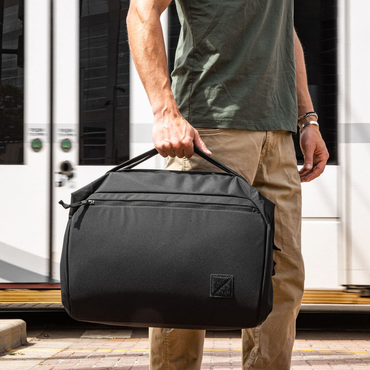 Transit Duffel 35L in Solution Dyed Black - top handle