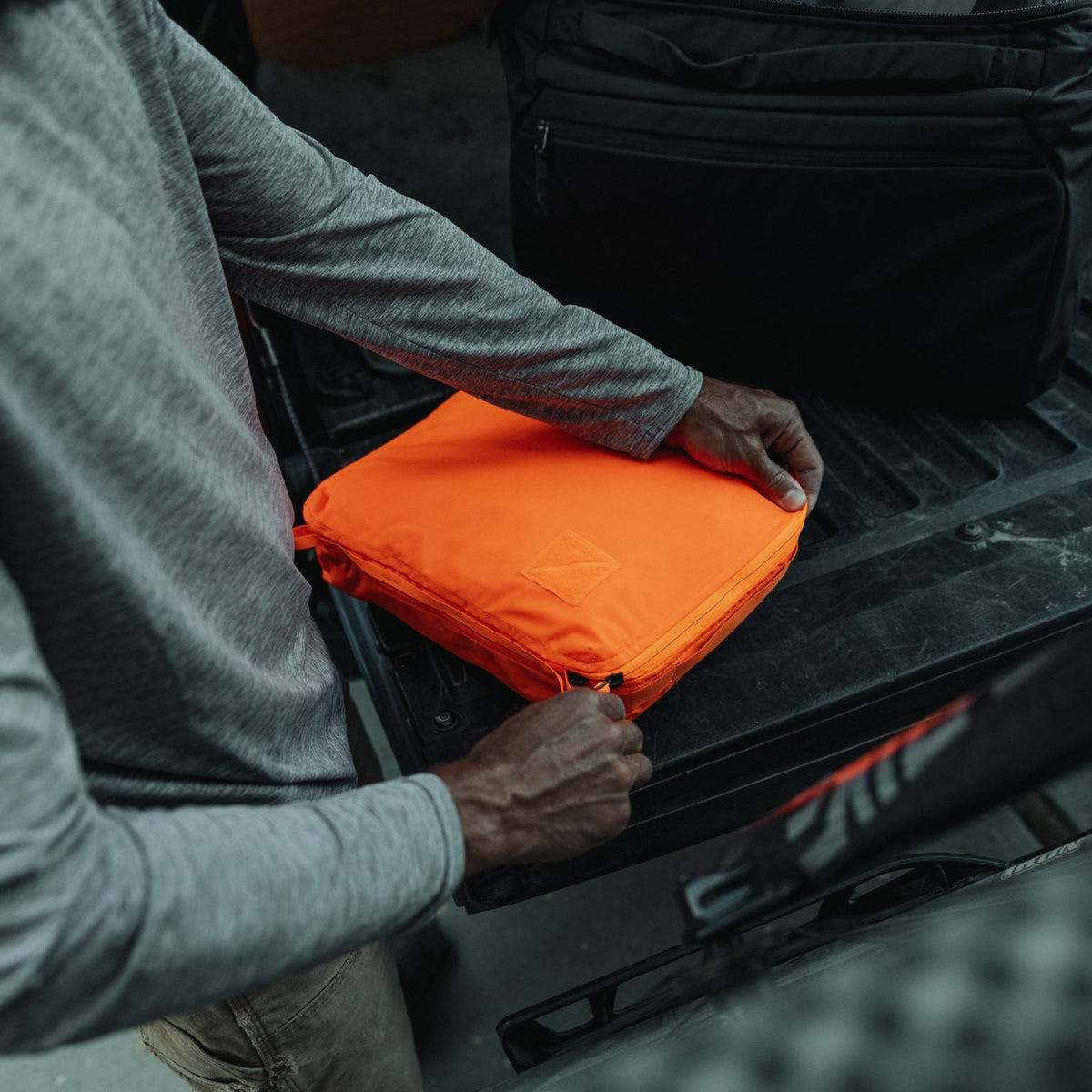 Transit Packing Cube 10L in Hot Orange - zipped close