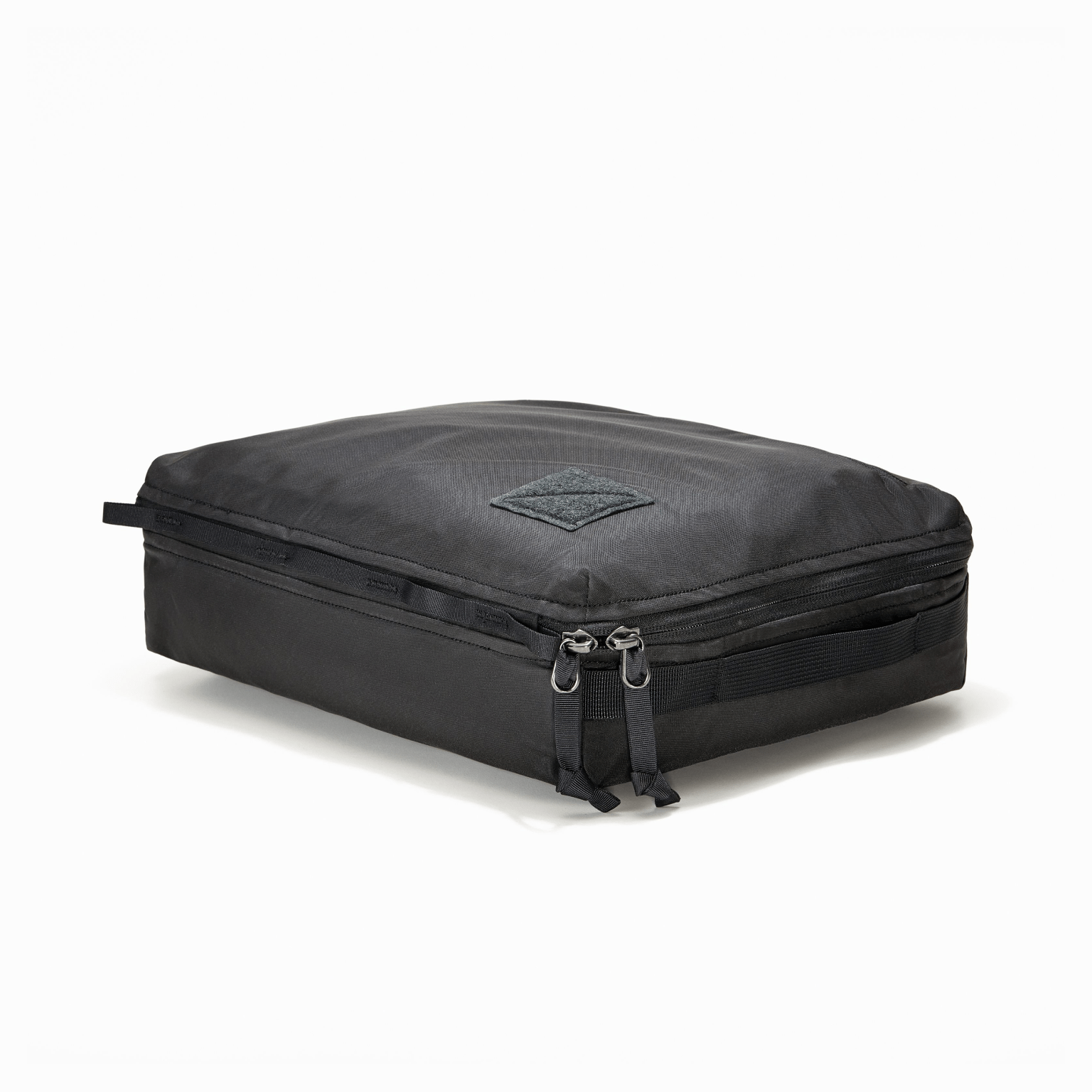 Transit Packing Cube 10L in Black - packed and laid flat [13021a-BLK]