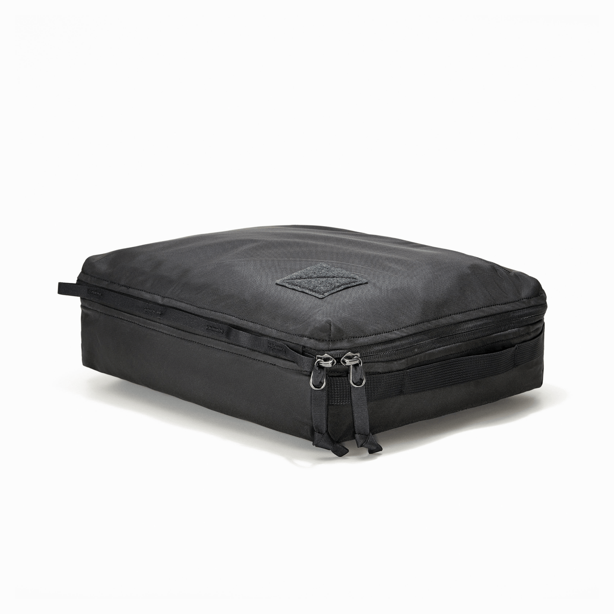 Transit Packing Cube 10L in Black - packed and laid flat