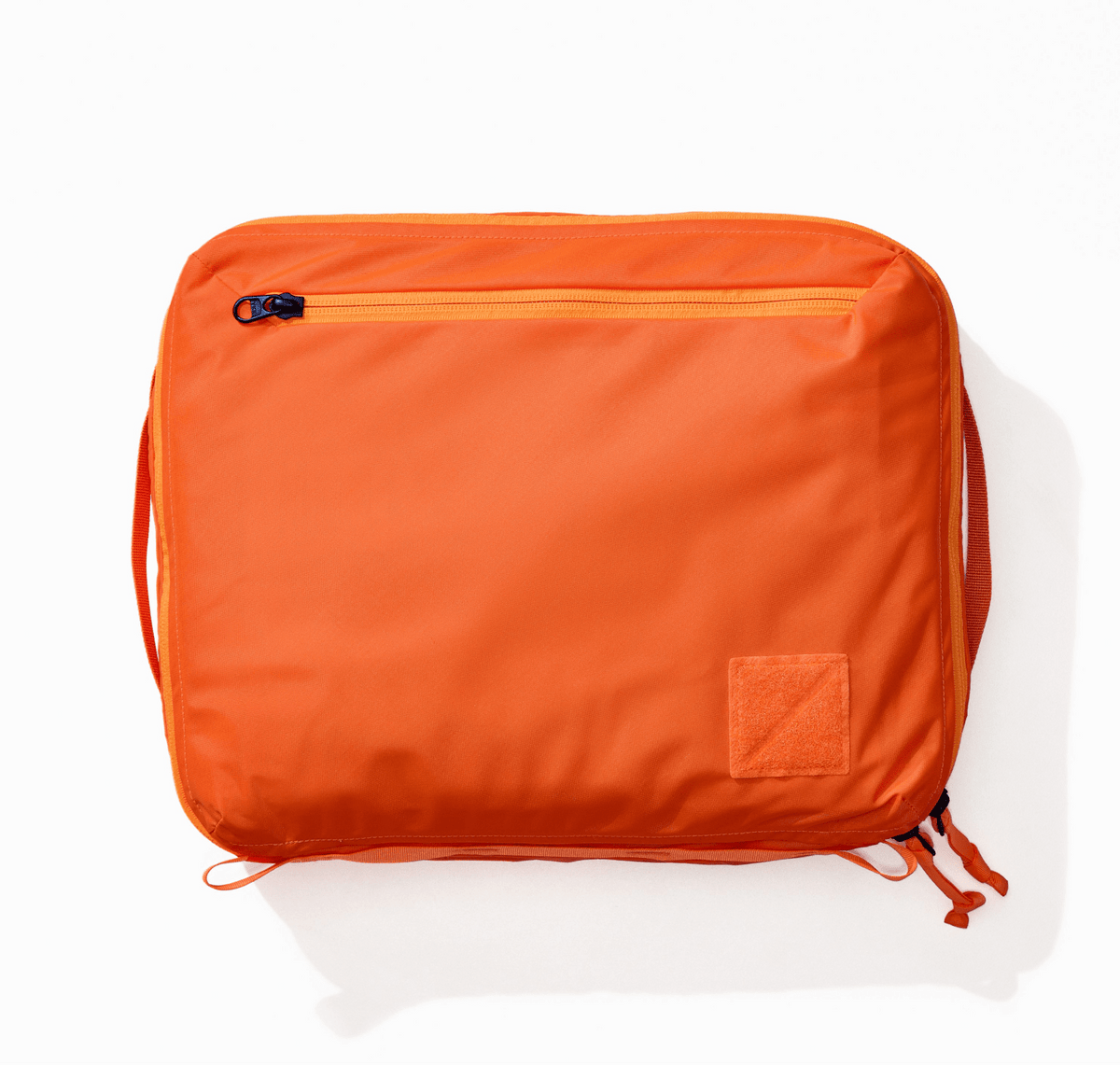 Transit Packing Cube 10L in Hot Orange - overhead view