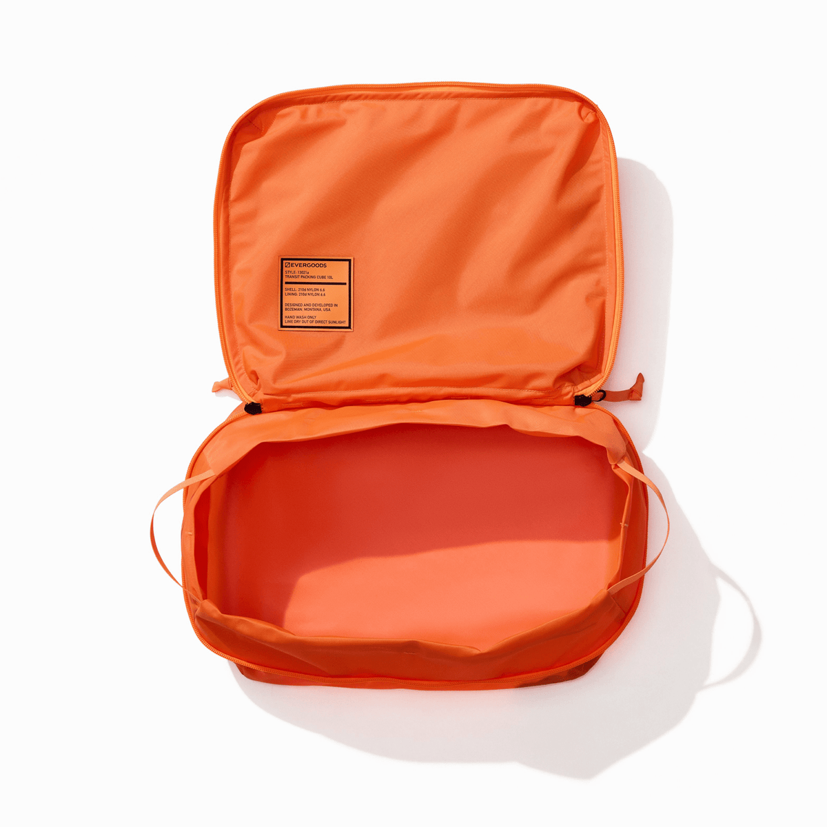 Transit Packing Cube 10L in Hot Orange - Wide open and empty