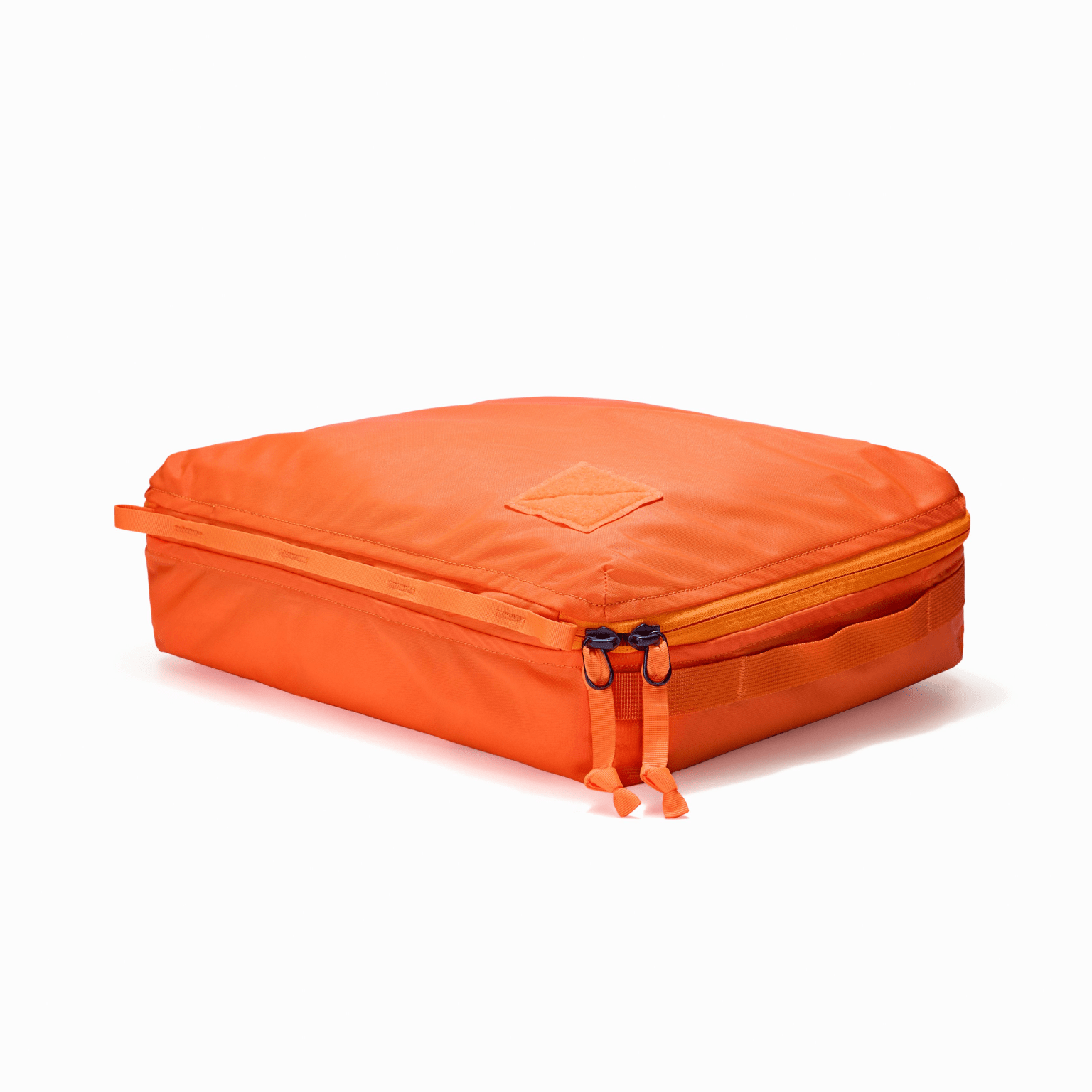 Transit Packing Cube 10L in Hot Orange - packed, full, and flat [13021a-HTO]