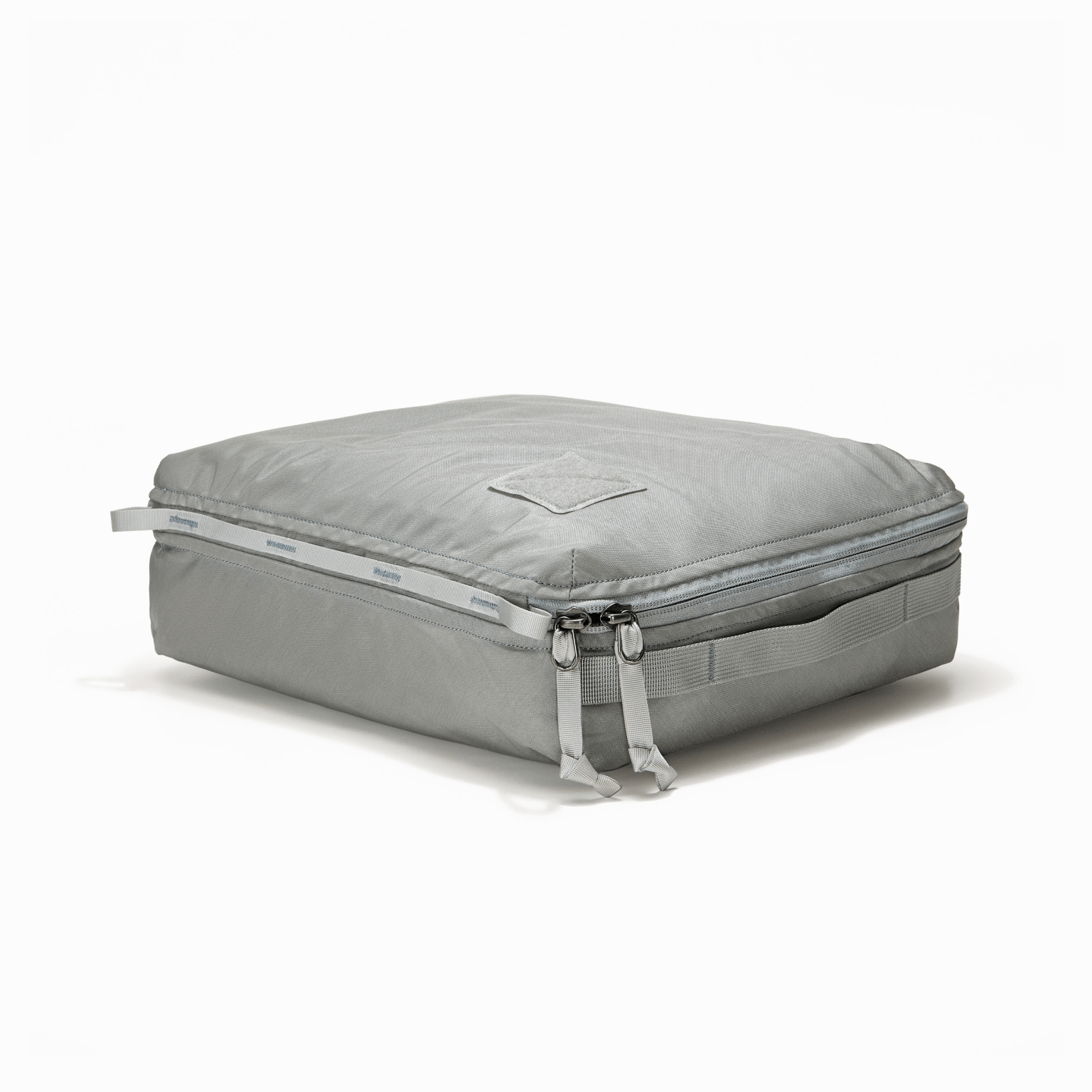 Transit Packing Cube 10L in Standard Gray - packed and laid flat [13021a-STG]