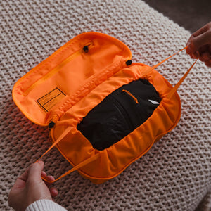 Transit Packing Cube 4L in Hot Orange - compression cord closure