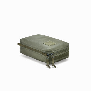 Transit Packing Cube 4L in OD Green - closed and laid flat
