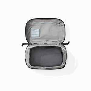 Transit Packing Cube 4L in Black - open and unpacked