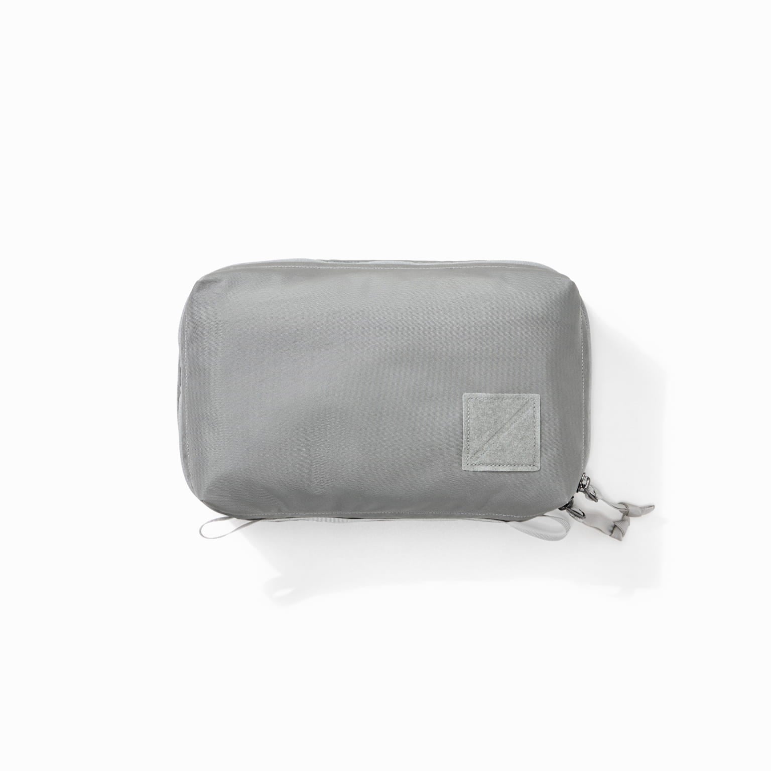 Transit Packing Cube 4L in Standard Gray - overhead image of packed cube [13026a-STG]