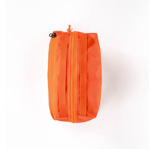 Transit Packing Cube 8L in Hot Orange top view of handles