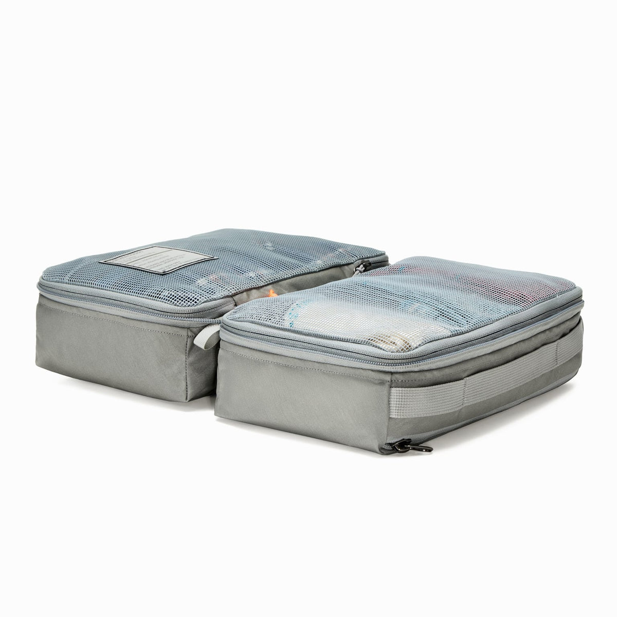 Transit Packing Cube 8L in Standard Gray open and flat on table