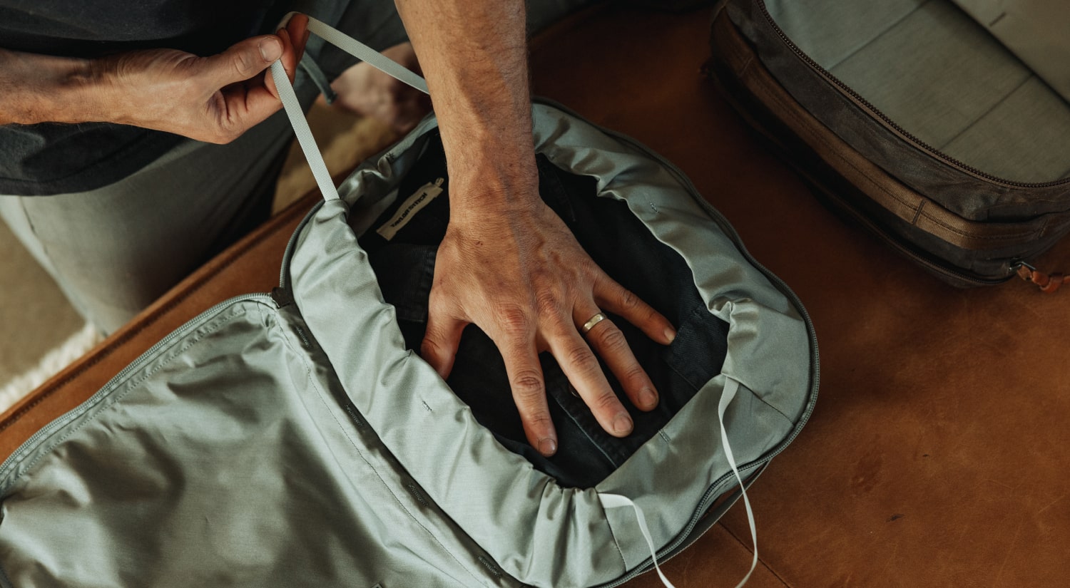 Transit Packing Cube 10L in Standard Gray compression cinch