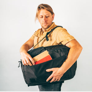 CIVIC Travel Bag 35L in solution dyed black side access pocket