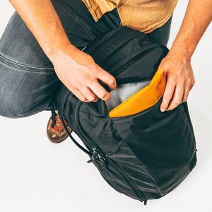CIVIC Travel Bag 35L in solution dyed black front dump stash pocket